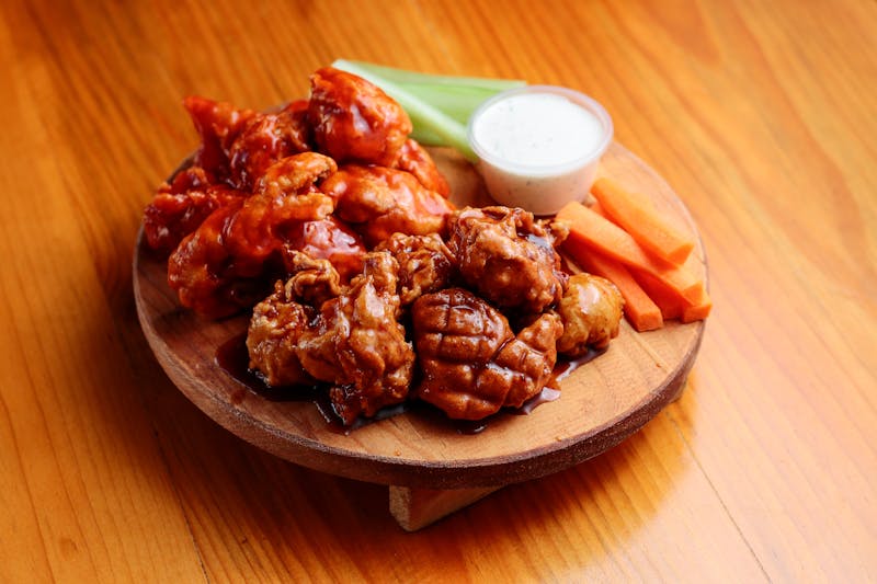 Classic bone-in chicken wings in assorted sauces